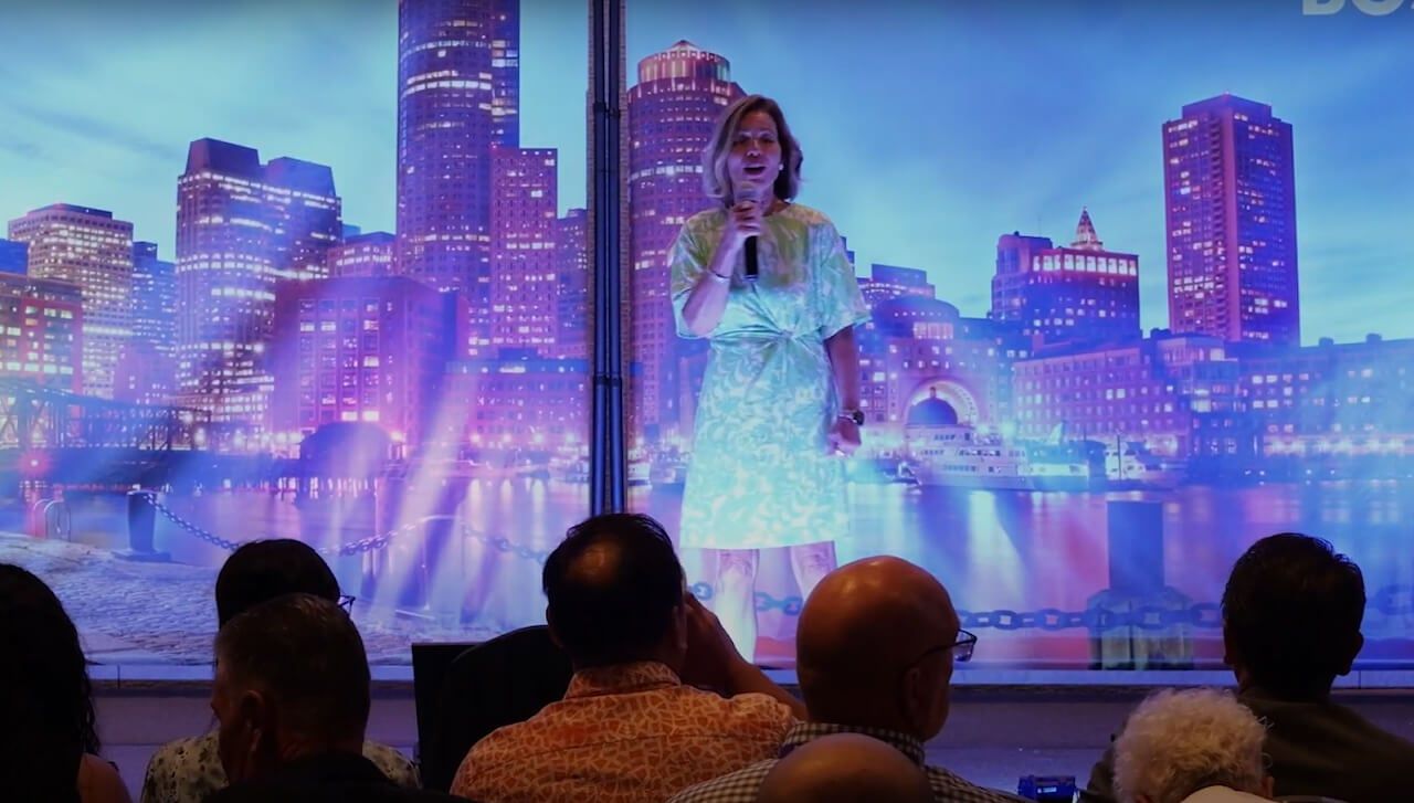 Lisa Parenteau speaking on stage